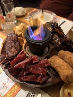 Pupu platter: Egg Rolls, Crab Wonton, boneless ribs, beef teriyaki, dynasty wings