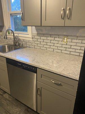 Installing kitchen backsplash day 1.