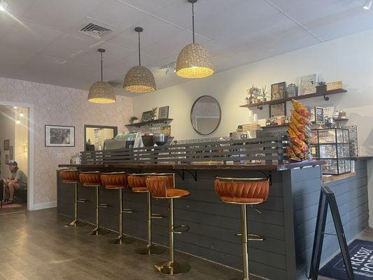 Cool coffee bar with very eclectic, retro styled seating!