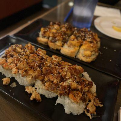 Baked Lobster Roll (upfront), Volcano Roll (behind)