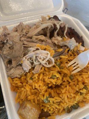 Pernil Plate with yellow fried rice and platanos