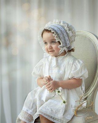 Sweet little girl in her Easter bonnet.