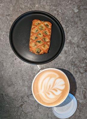 Spinach and feta croissant with latte