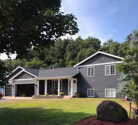 Beautiful Roof, Siding, and garage doors done by Legacy Roofing & Restorations