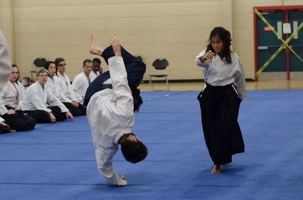 Head instructor Sanpisa finishing a throw at a Kokikai national camp