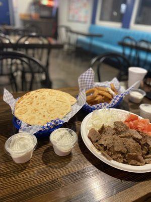 Yummy gyros plate and onion rings