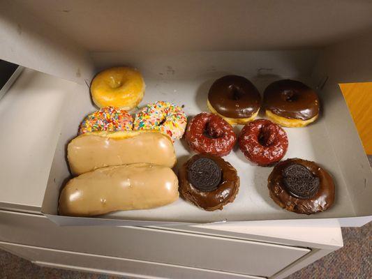 Maple bars, sprinkle, glazed, chocolate, red velvet, and oreo chocolate donuts.