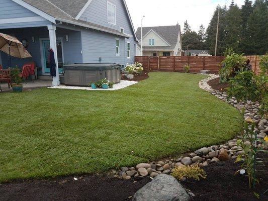 6 hours later we had a beautiful French drain and lawn!