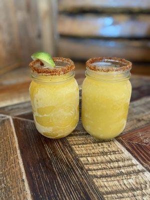 Frozen mango margarita and frozen passion fruit margarita