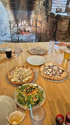 Delicious flatbread pizzas and corn-topped carrot ribbon salad