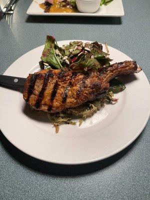 Pork chop with beet salad and cabbage