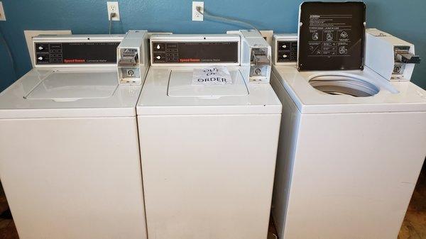 One washer was working but only one was labeled out of order. Clothes were soaking wet and had to be wrung out by hand.