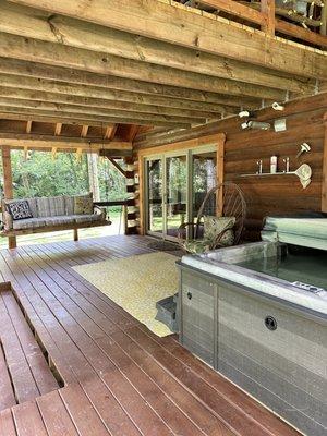 Relaxing back porch with hot tub