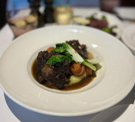 Queues de Boeuf au Vin Rouge: Braised oxtail, red wine, carrots, pomme puree ($35)