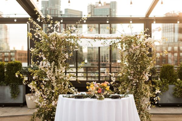 Wedding arch/chuppah (which had twinkly lights for the evening)