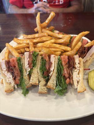 Triple turkey, bacon club sandwich with the crispy fries.