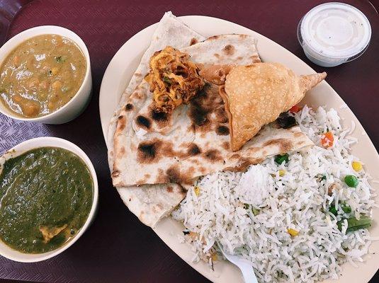 saag paneer, vegetarian korma, and a samosa