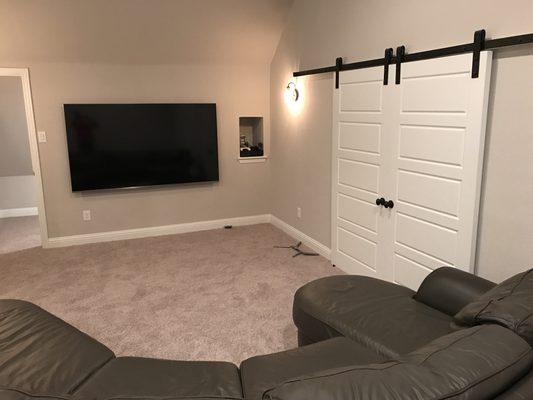 80 inch Tv installation with sliding doors.