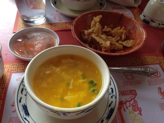 Egg drop soup, noodles and duck sauce, hot tea