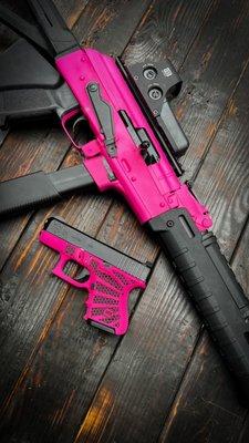 Custom9mm combo. Hot pink and black Cerekote. Our popular super nova stipple and hex serrations on the Glock 26.