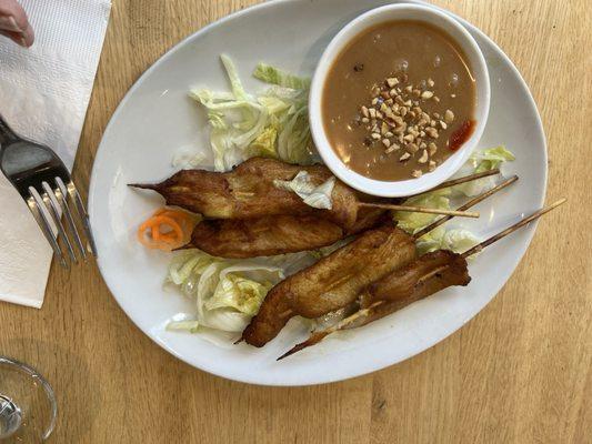 Chicken Satay with peanut dipping sauce.