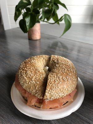 Sesame bagel with lox.