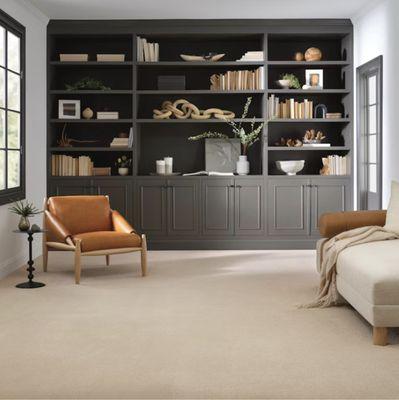 This neutral carpet brings warmth and sophistication, creating a seamless foundation for a variety of design aesthetics.