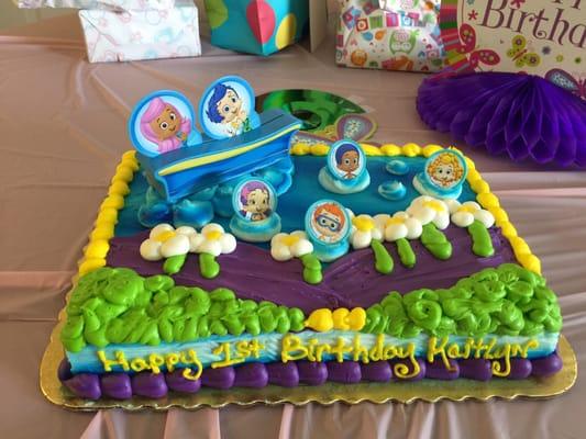 Bubble guppies! Happy Birthday is on the front so that the cake image stands out.