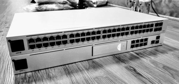 48 port managed Unifi POE switch and Unifi Dream Machine Pro (router / firewall / IPS etc)