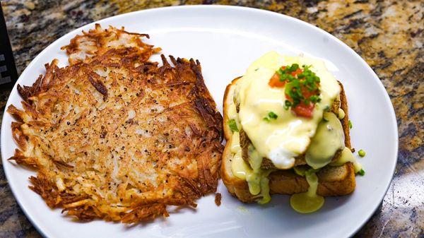 Deep fried salmon egg Benedict with garlic hollandaise and hash brown