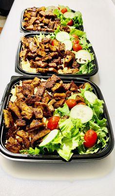 Grilled Lamb over rice and salad.