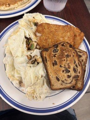 Chicken fajita omelette, hash browns, and cinnamon raisin toast