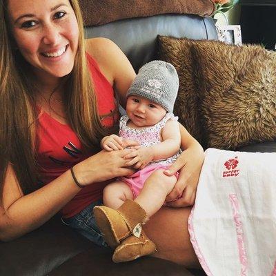 Super Cute Baby geared up in our Surfer Baby Sheepskin booties and Surfer Baby beanie