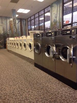 Row of washing machines.