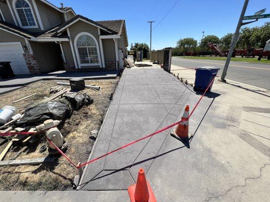 Stamped concrete on side driveway