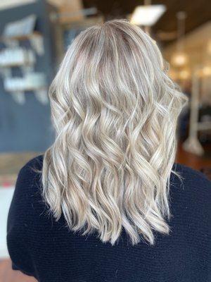 Blonde highlights with a root shadow by Courtney