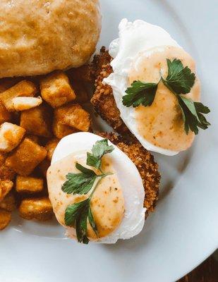 Eggs Meeting Street:
 Crab Cake, Fried Green Tomato topped with a poached egg and our special sauce.