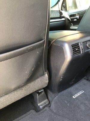 Dirt on back seat and console