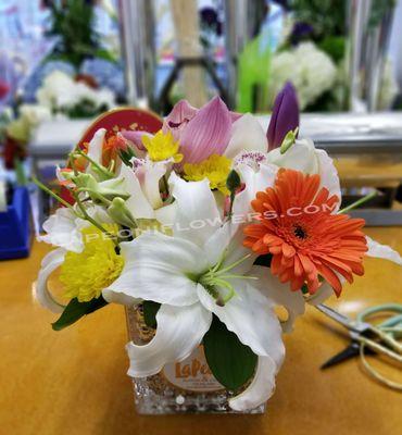 Blooms on Vases as low price as $60 for standard arrangment for any occasions.