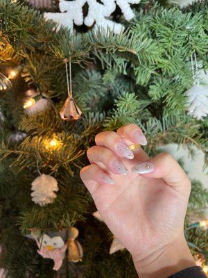 Hailey Bieber glazed nails with stars to match my Christmas tree