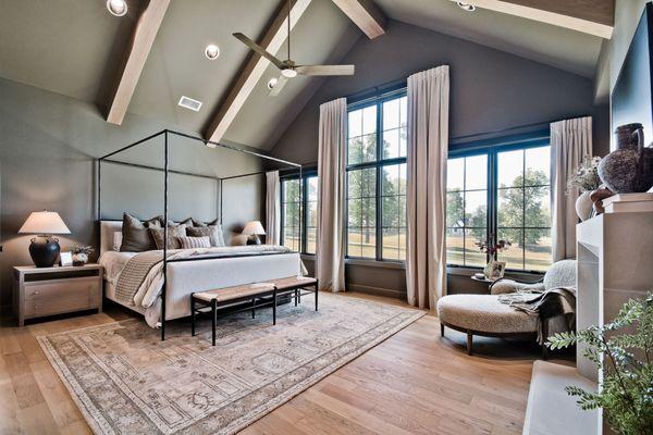 Master bedroom with beamed ceiling