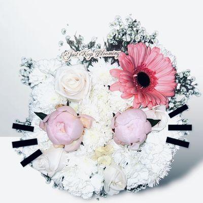 "Meowadise Bouquet"inspired by everyone's favorite feline.  Assorted white fresh cut flowers, pink peony eyes, and a statement daisy