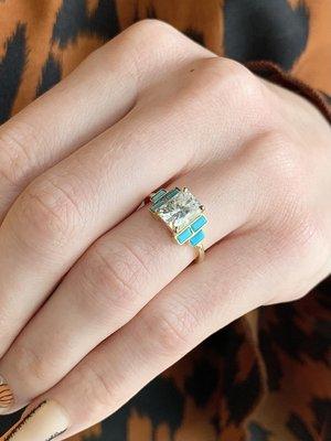 The Sonora! 2.04 carat radiant cut moissanite and turquoise baguettes in yellow gold.