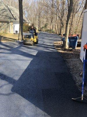 New asphalt driveway getting paved in Cheltenham pa