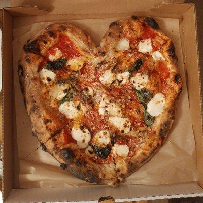 Heart shaped pizza for Valentine's Day