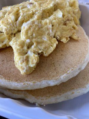 Fluffy pancakes  and tasty scrambled eggs