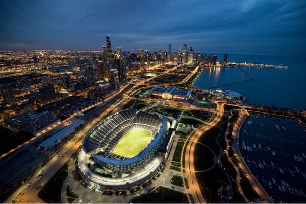 Chicago looking at Soldier's Field, Grant Park, Navy Pier, Millennium Park, and Buckingham Fountain.