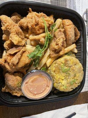 Crispy Chicken with fries and a side order of Mofongo