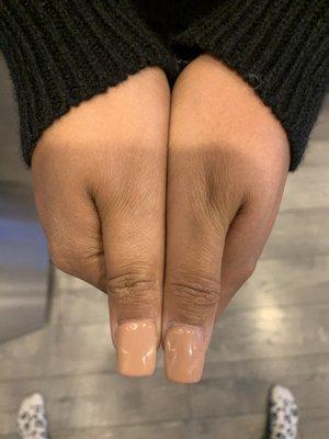 One nail is longer than the other