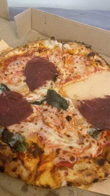 3 pieces of bresaola on the entire pizza - and cut up pieces at that...